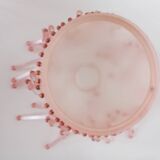 Pink glass wall lamp with garland of pearls