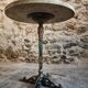 Bistro table / old garden with a cast iron base and stone top, France