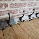 Solid teak coat hook with 4 double cast iron hooks
