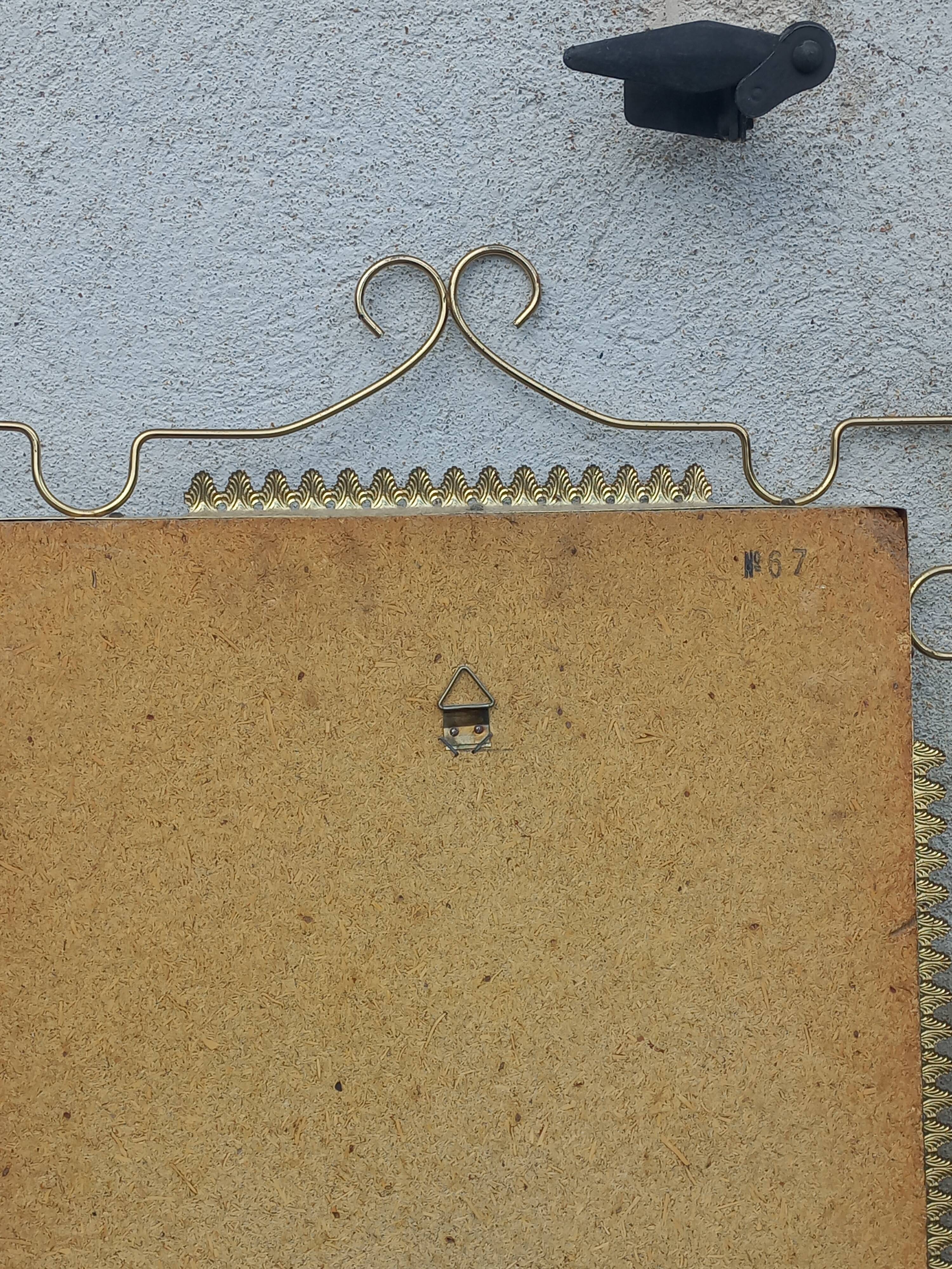 Vintage 1950s neoclassical style gold metal mirror