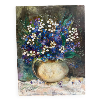 Oil on panel signed flowers in a vase.