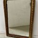 Louis Philippe gadrooned mirror in wood and gilt stucco, 19th century