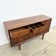 Teak Jentique sideboard — 1 door, 2 drawers & drop-down bar, England 1950s-60s