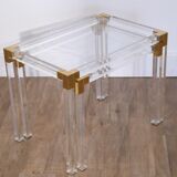 Nesting tables from the 1970s in brass, glass and lucite