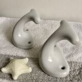 Pair of white porcelain hooks