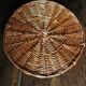 Medium round wicker plateau with two handles.