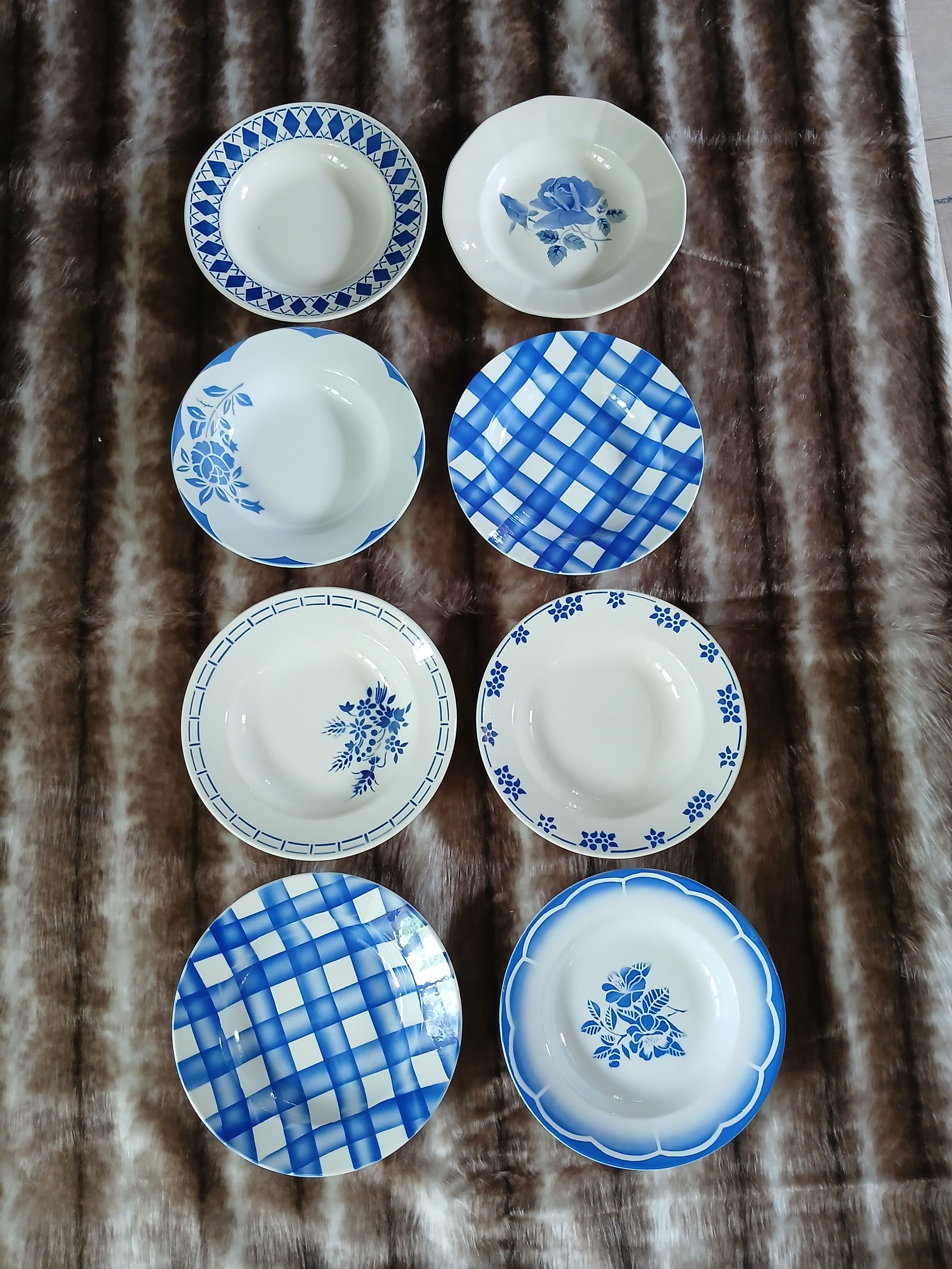 8 mismatched antique deep plates