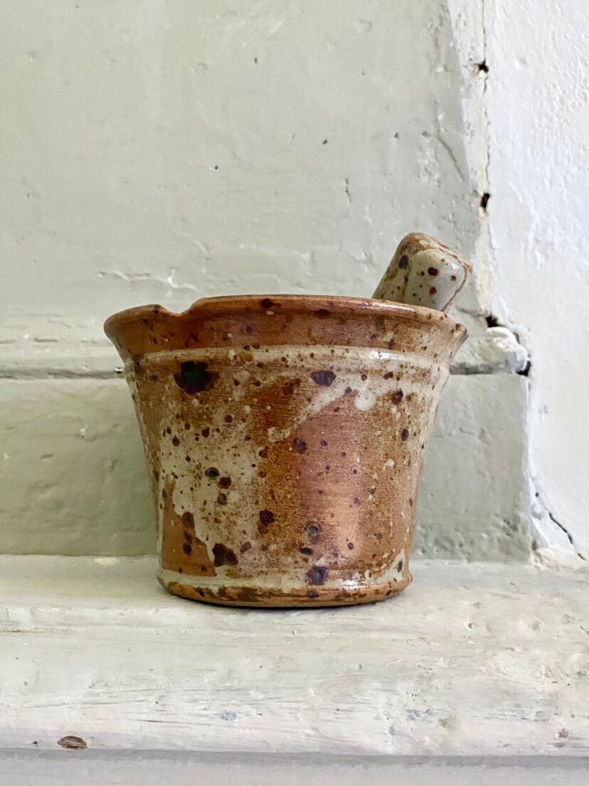 Pyrite sandstone mortar and its pestle