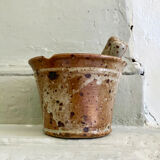 Pyrite sandstone mortar and its pestle