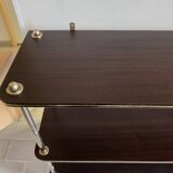 Wooden shelf with gold metal