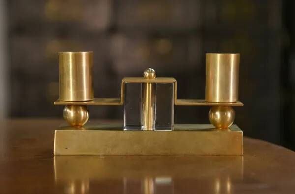 Pair of brass and Bohemian crystal wall lights in the style of Jean Royère, 1940s