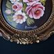 Still life in Tondo oil on panel of a bouquet of pink roses signed