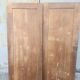 pair of antique solid oak cabinet doors with bird decor