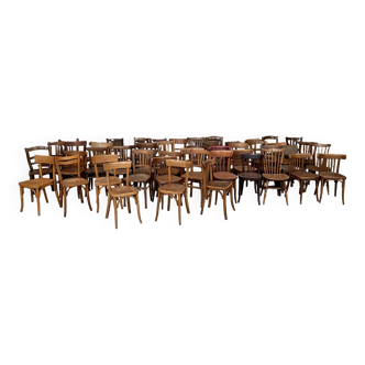 Set of 50 mismatched vintage bistro restaurant chairs