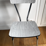 White and grey Formica chairs