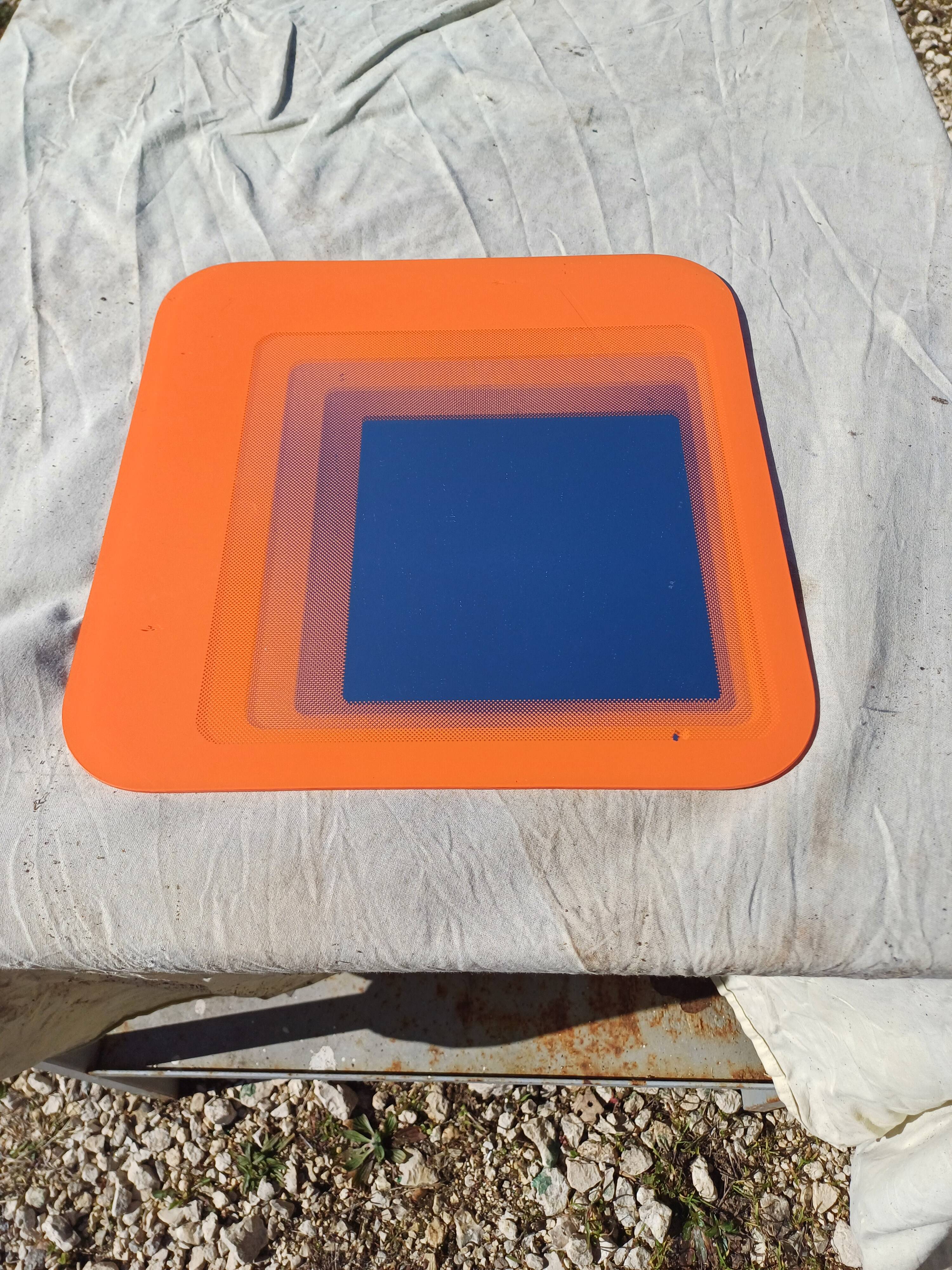 Vintage orange glass mirror