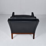 Leather and rosewood armchair by Kai lyngfeldt-Larsen. Denmark