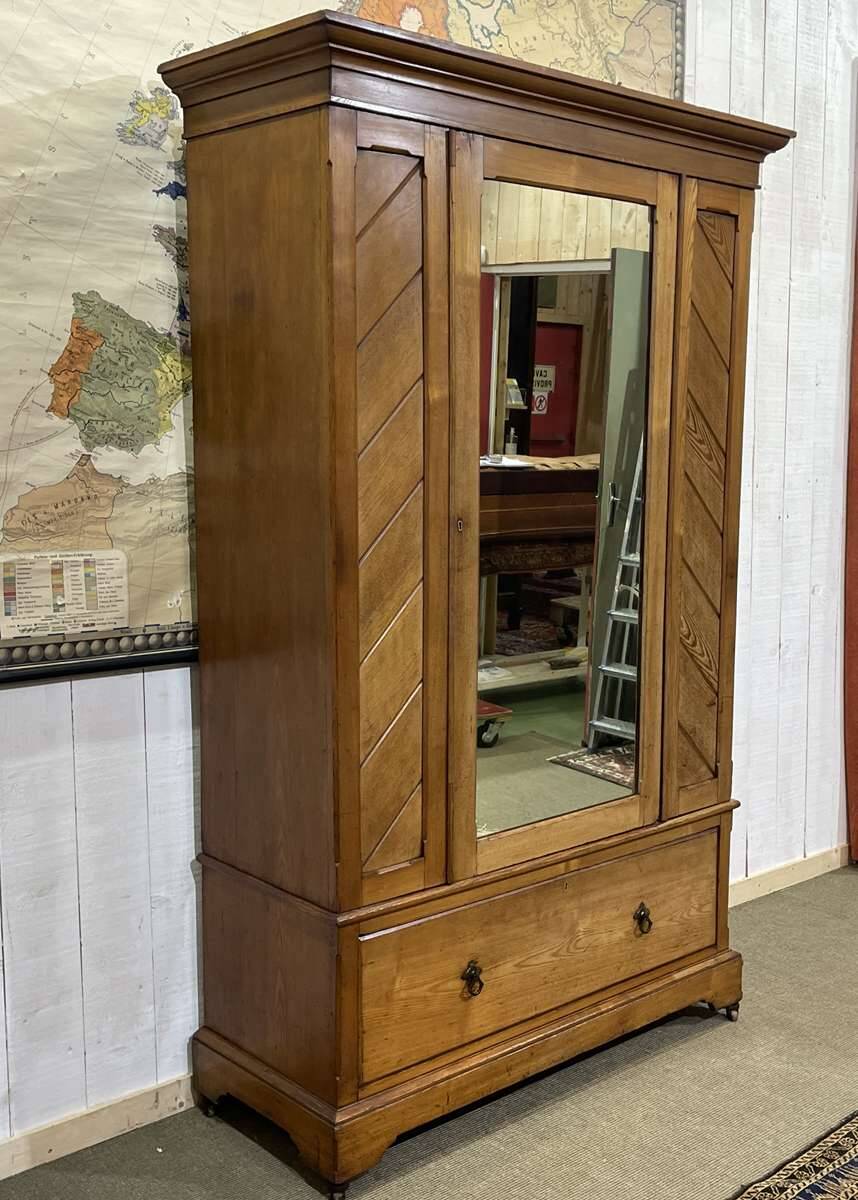 English oak wardrobe from the early 20th century.