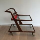 Rolling table made of wood, brass and glass