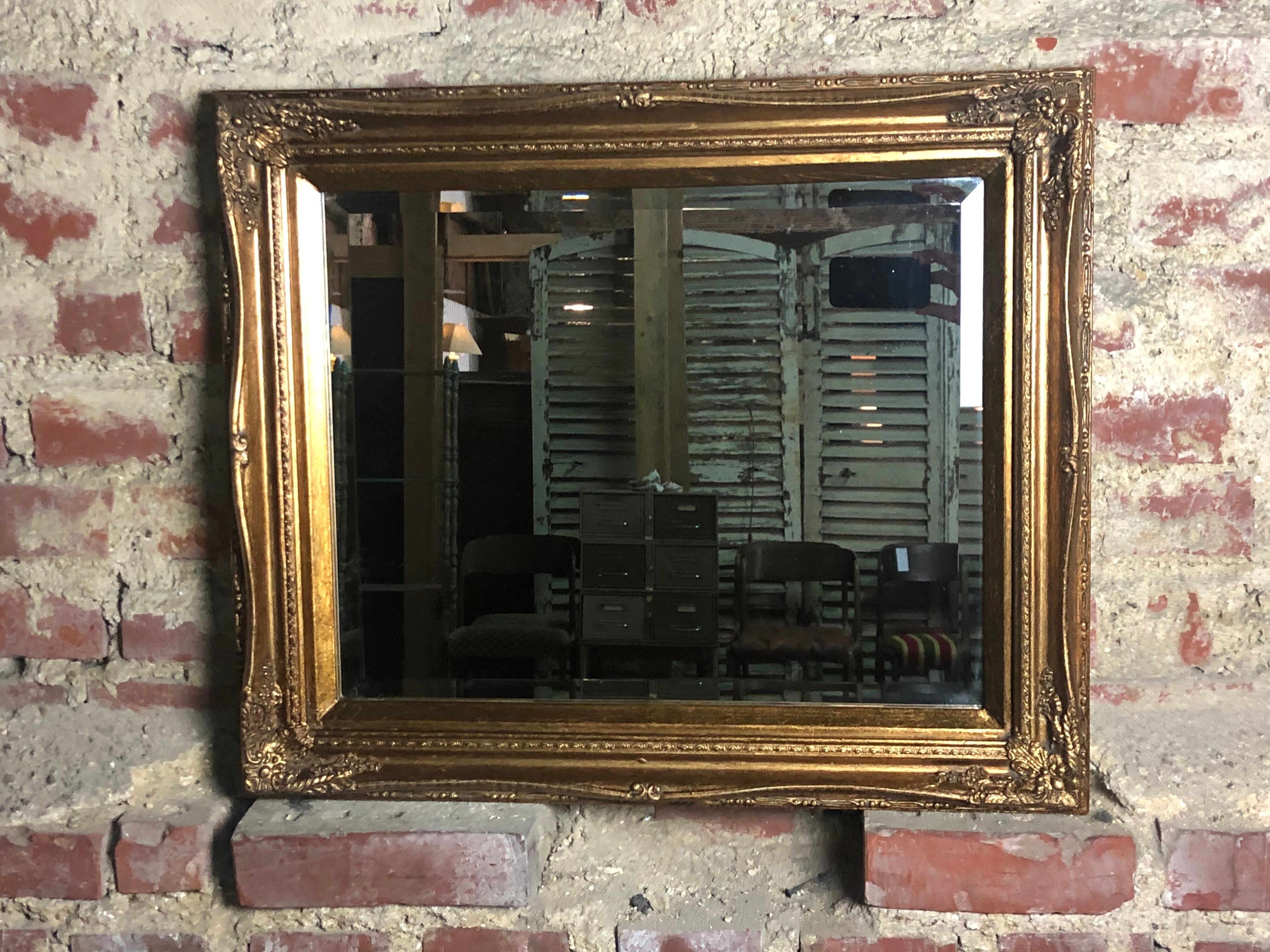 Oval mirror style Louis XV patinated gold 63 x 53 cm