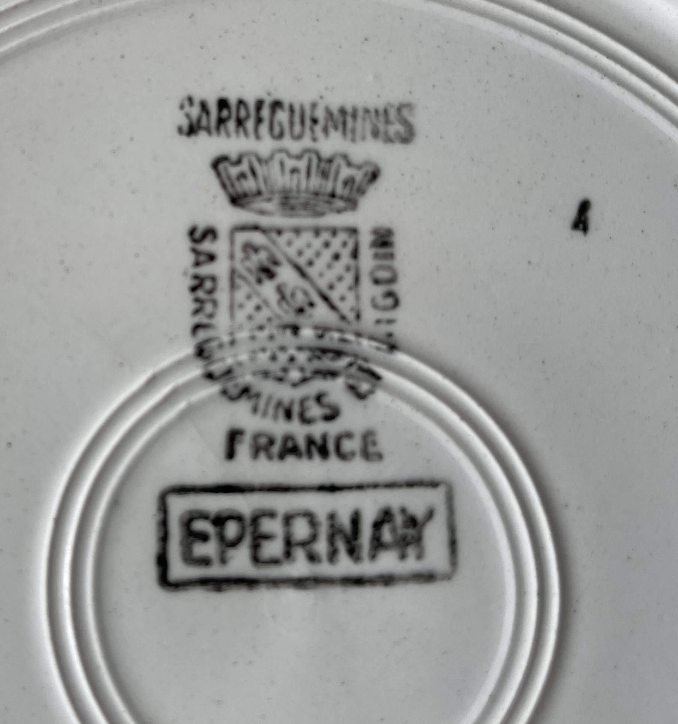 8 antique deep plates in Sarreguemines earthenware.