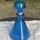 Blue bottle, glass vial for vintage perfume or liqueur.