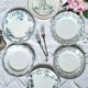 Old mismatched flat plates made of ironstone earthenware.