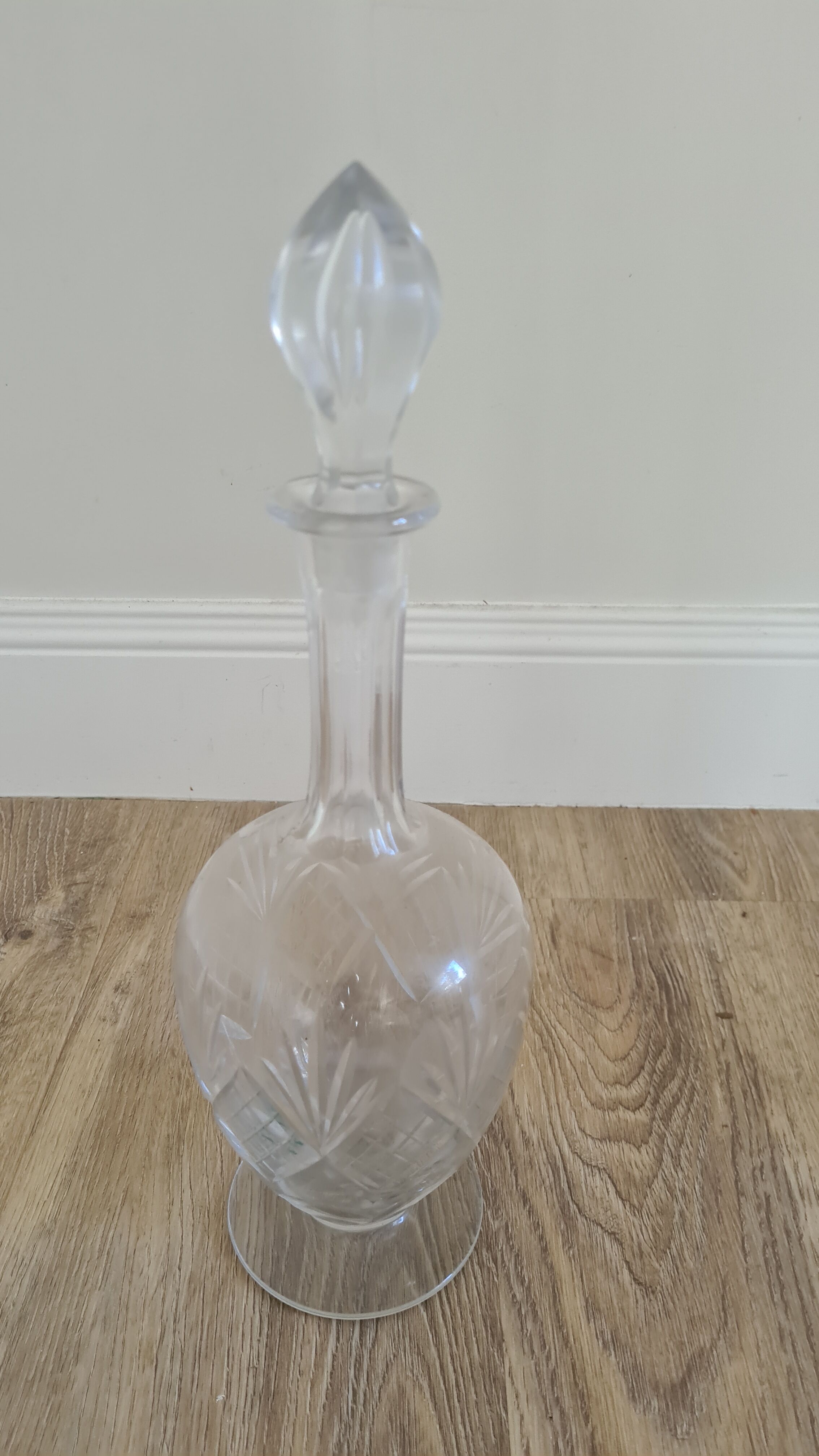 Old glass decanter with stopper