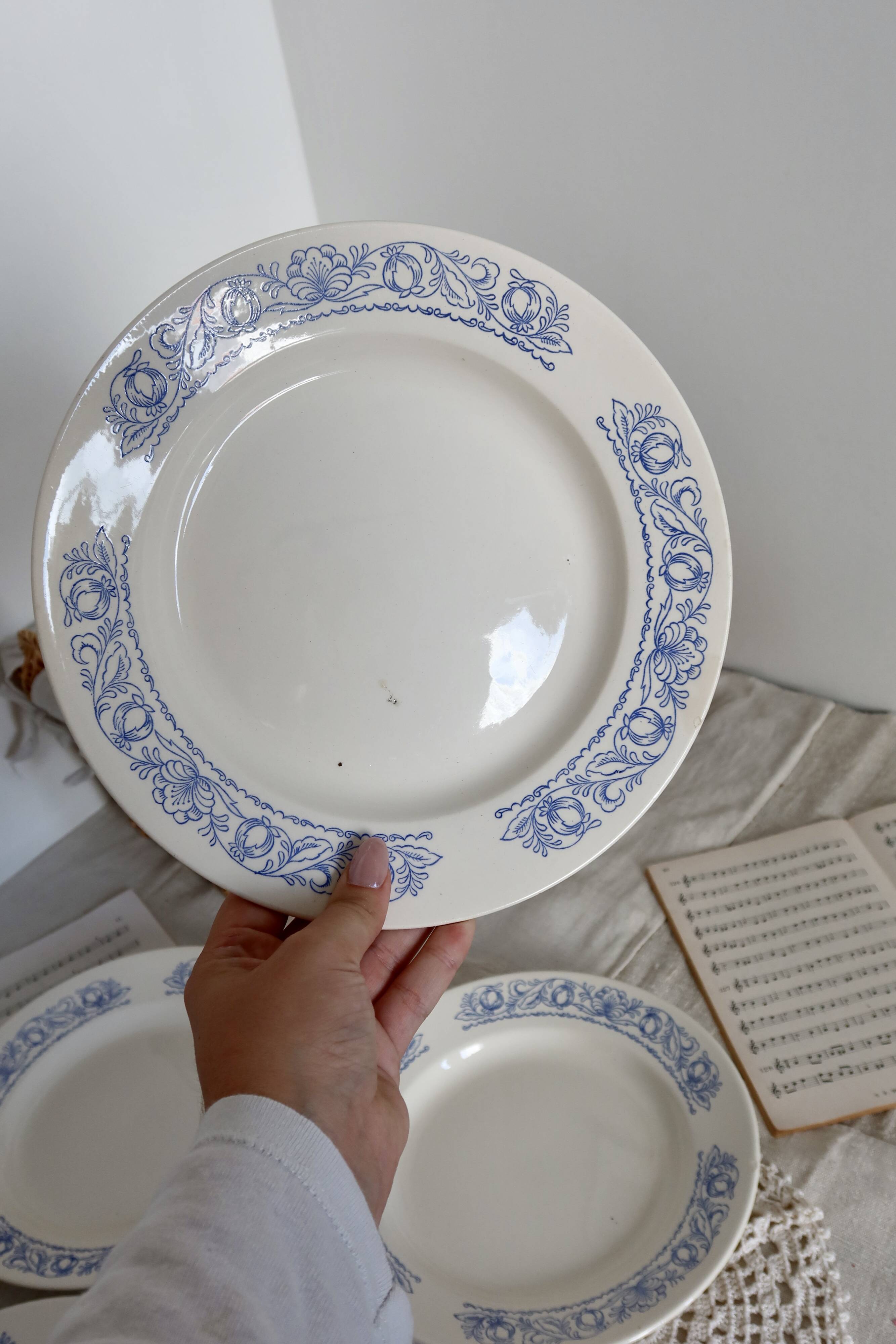 4 vintage white soup plates with blue border