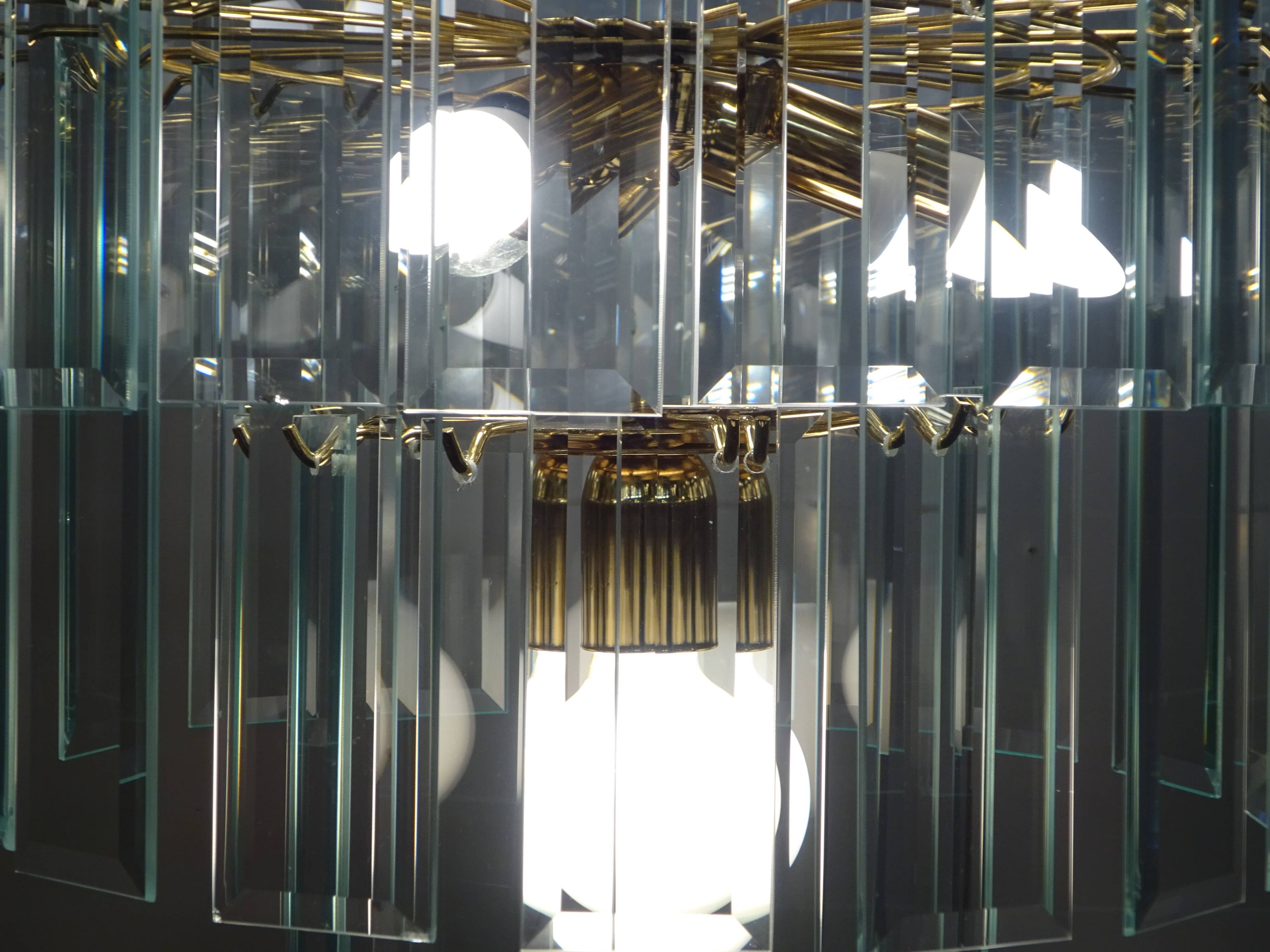 Brass chandelier and beveled glass, Italian manufacturing