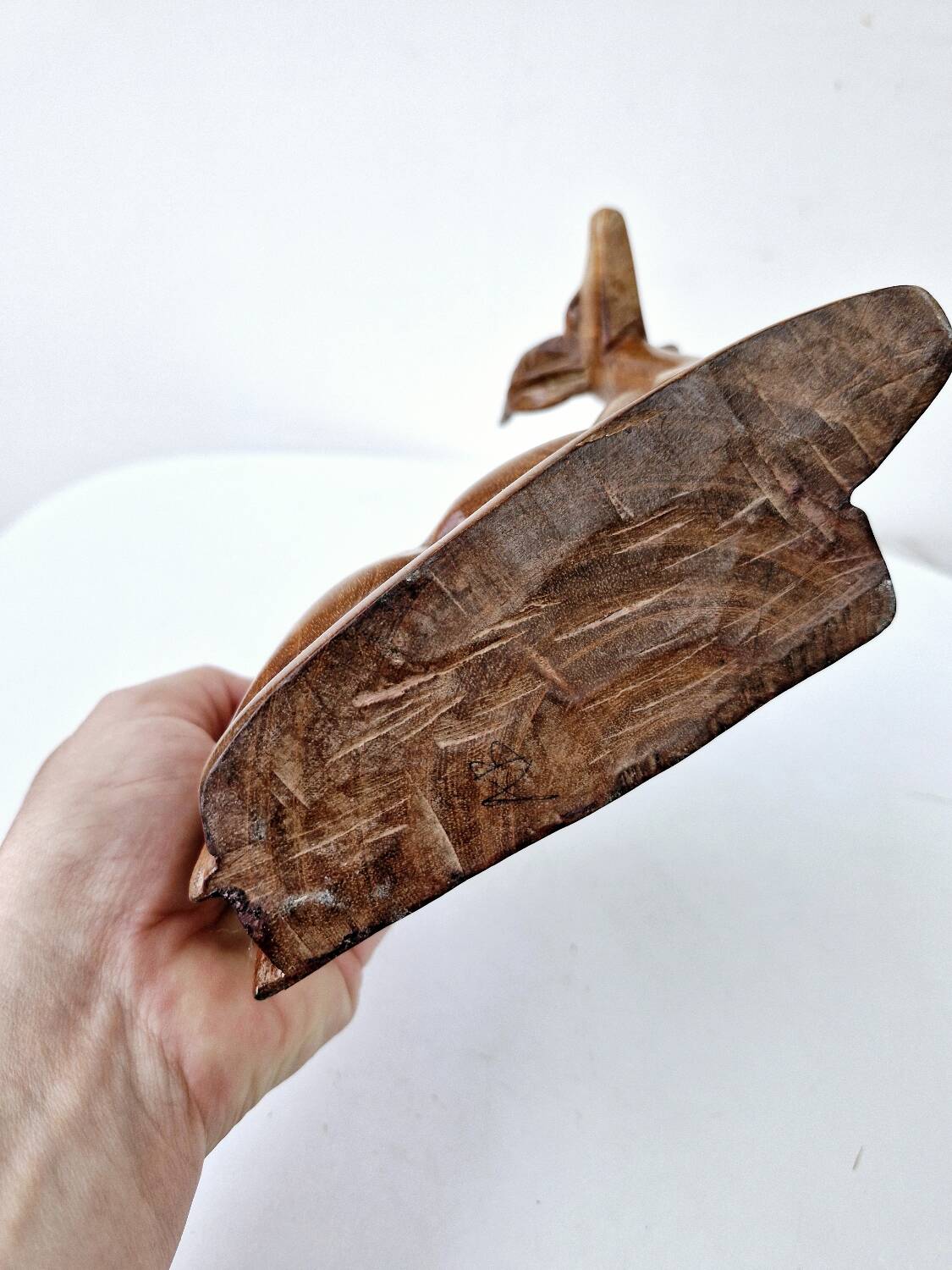 Old antelope bookend in hand carved wood