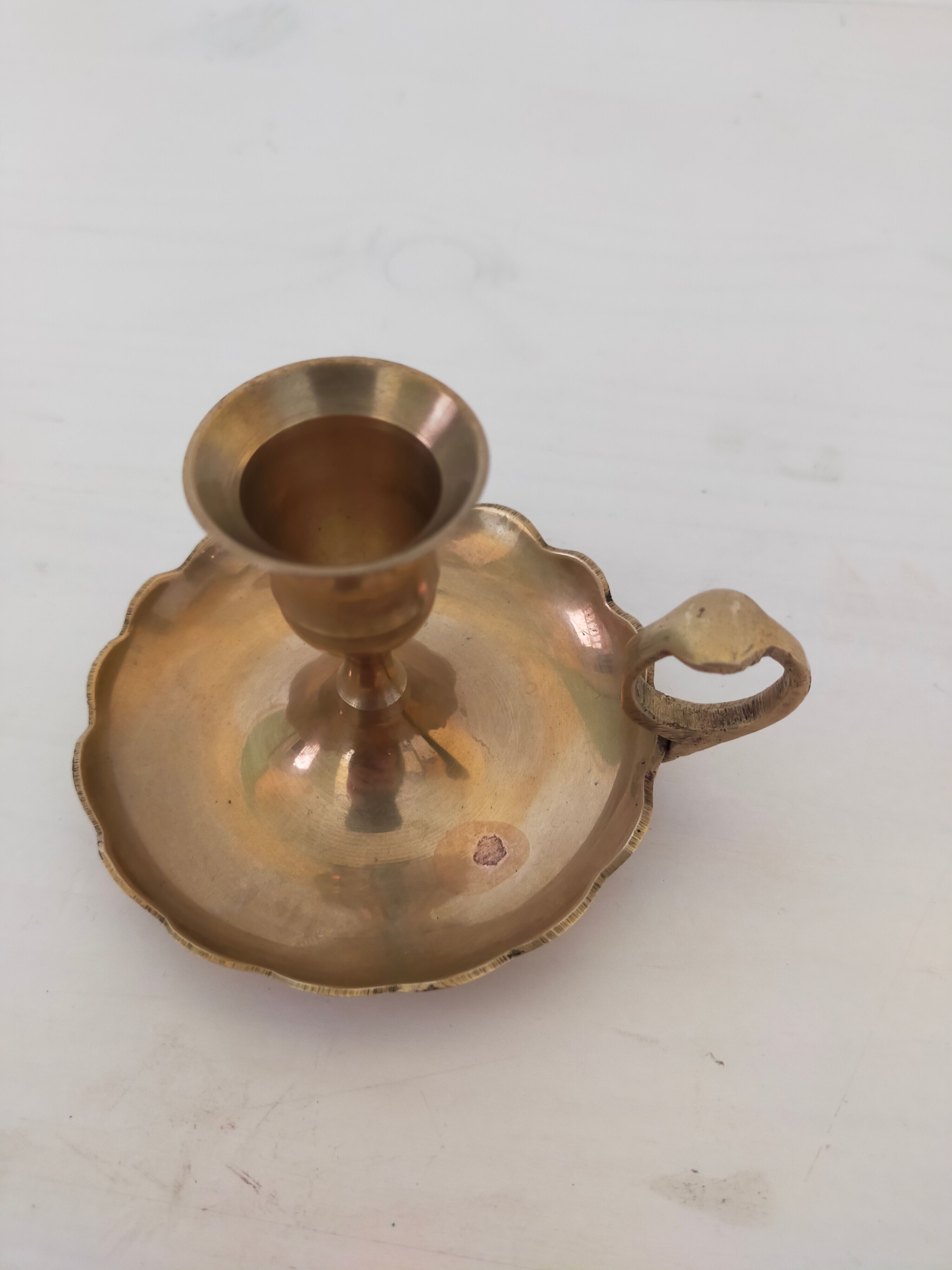 Brass handheld candle holder