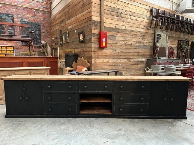 Old piece of furniture transformed into a TV stand