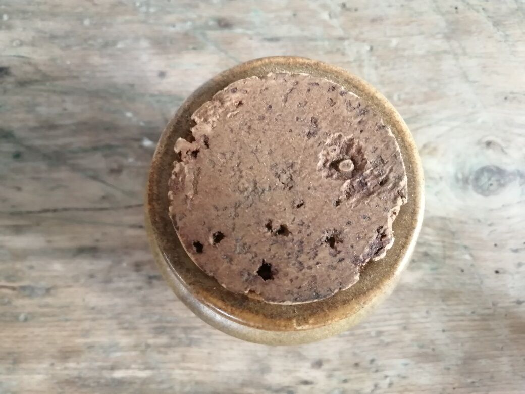 Old sandstone pot with cork