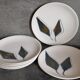 Six ceramic plates with matt enamel 50s