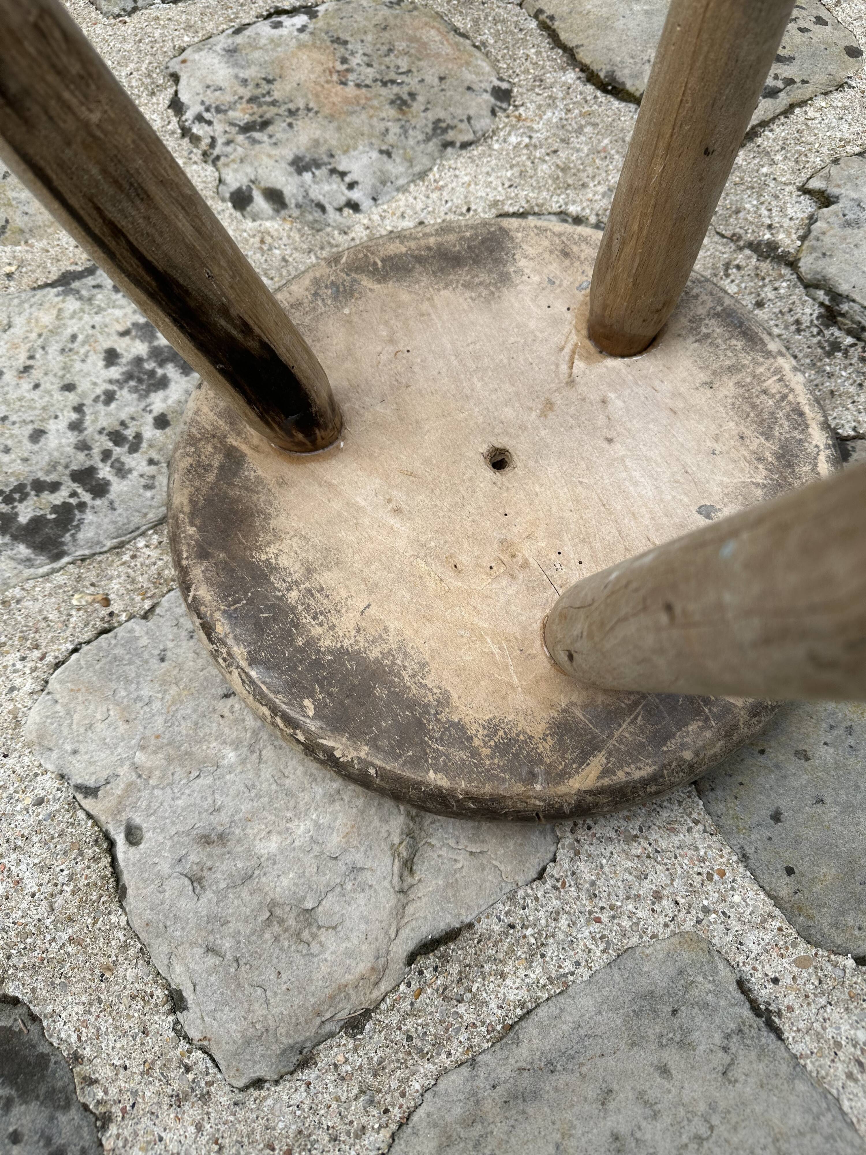 Tripod stool brutalist