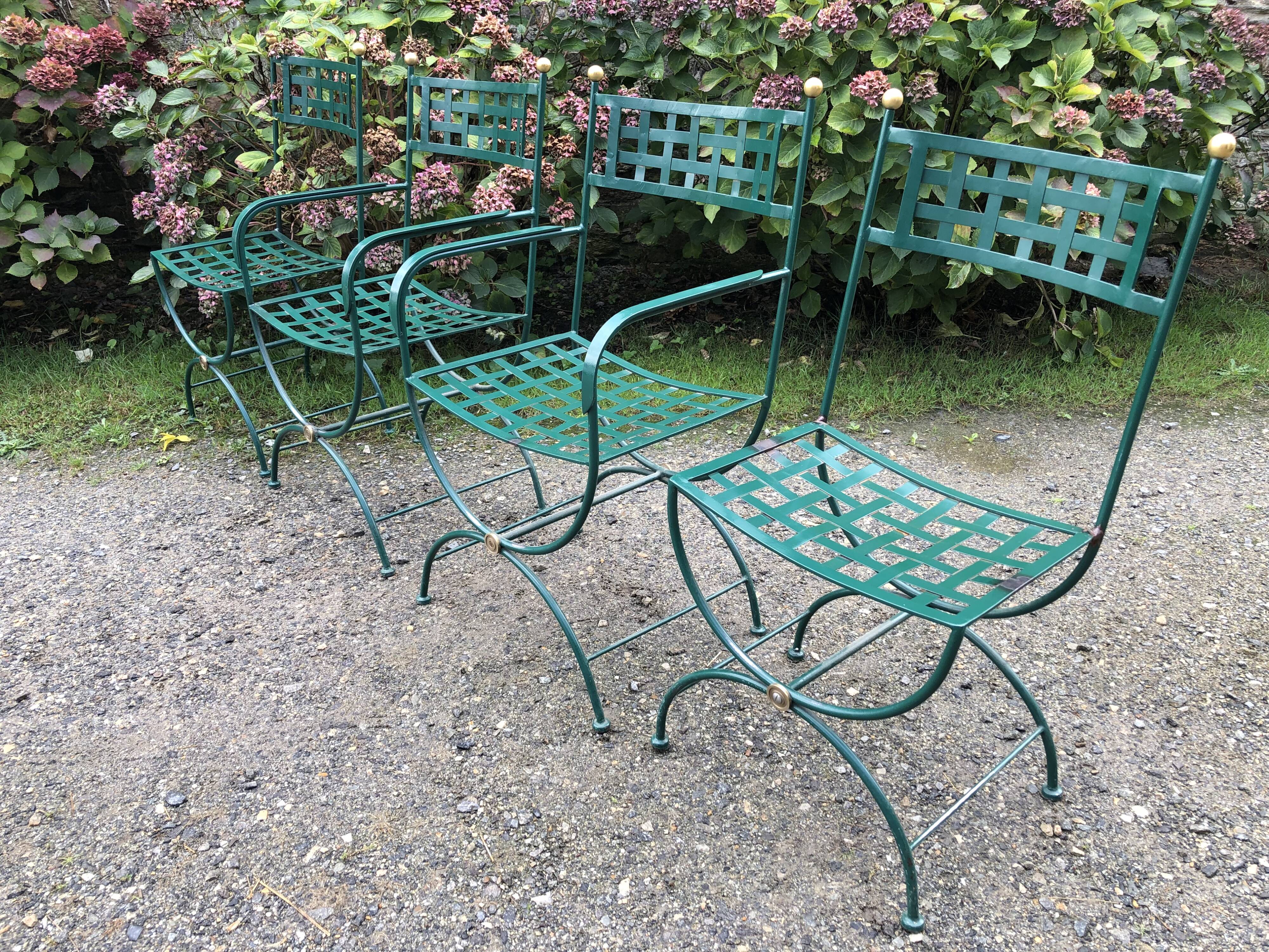 2 armchairs and 2 chairs in full wrought iron, handcrafted.