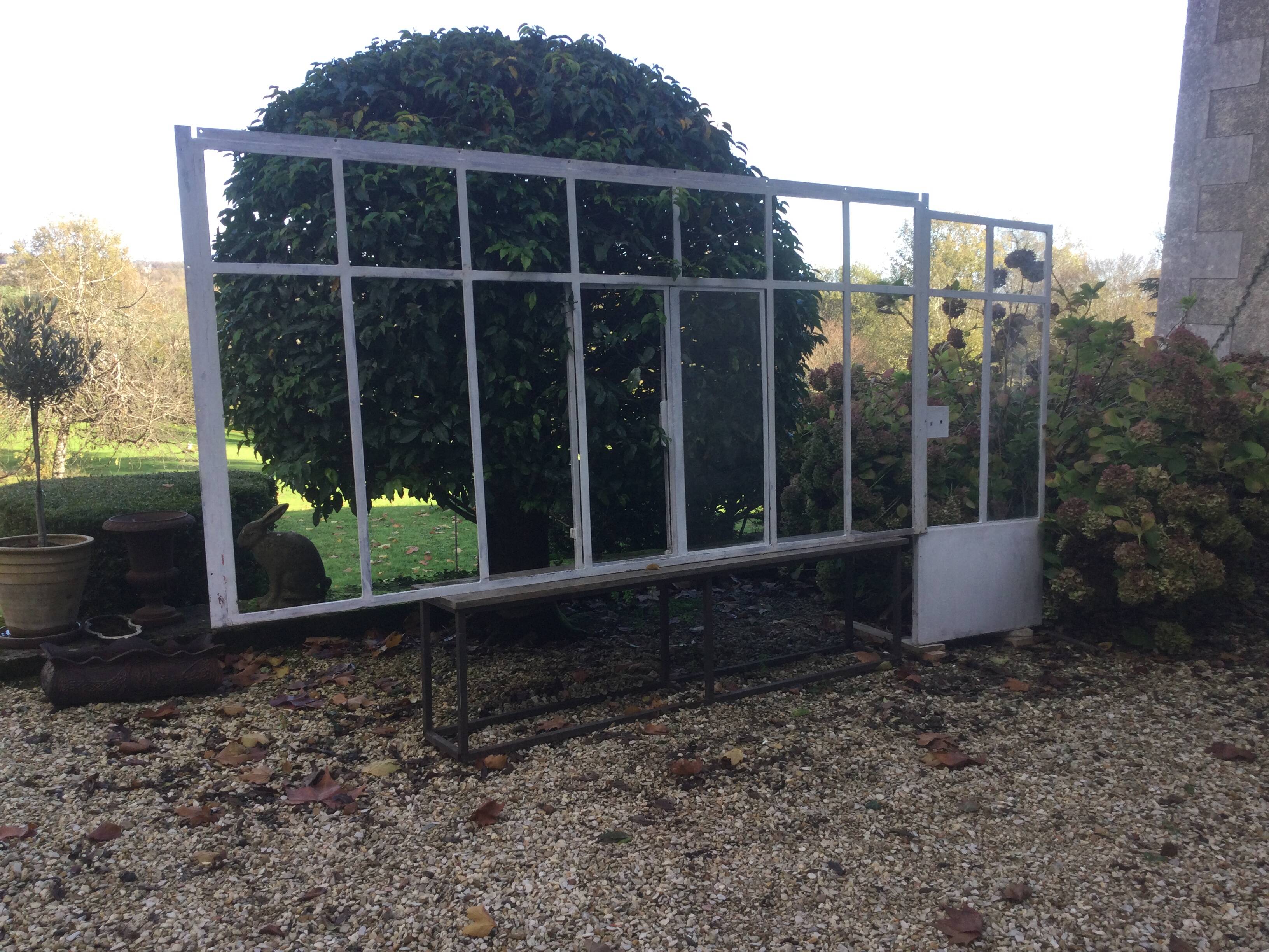 Old glass roof with door and window