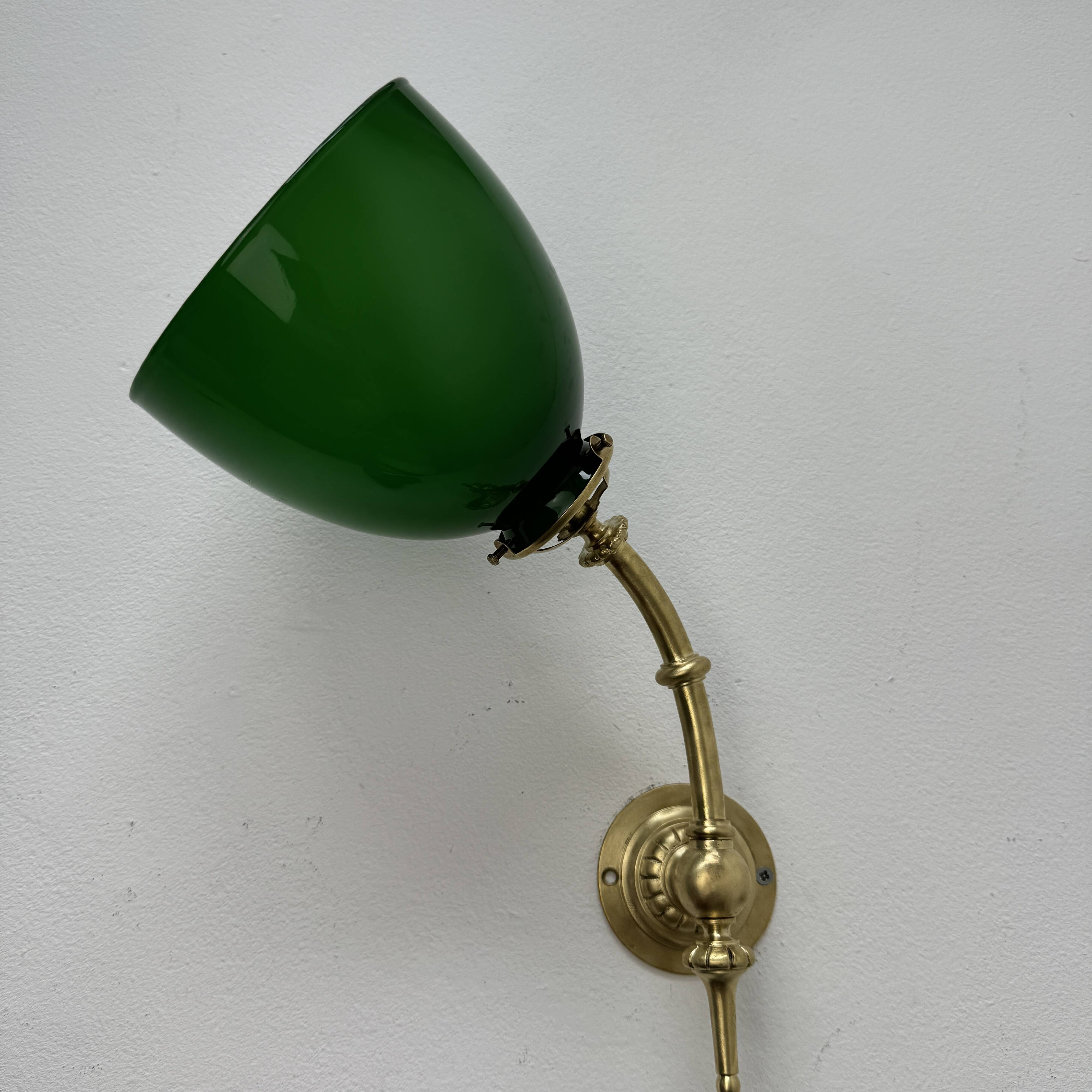 Antique articulated opaline wall light