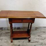 Small wooden drop-leaf table