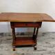 Small wooden drop-leaf table