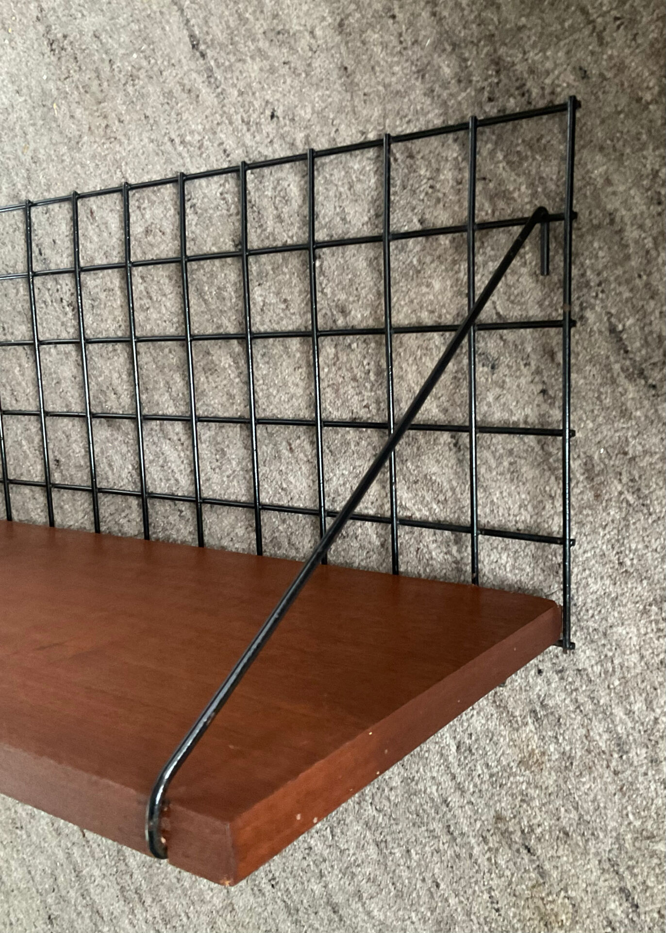 Wall shelf by Pierre Guariche for Meurop from the 60s-70s.