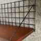 Wall shelf by Pierre Guariche for Meurop from the 60s-70s.