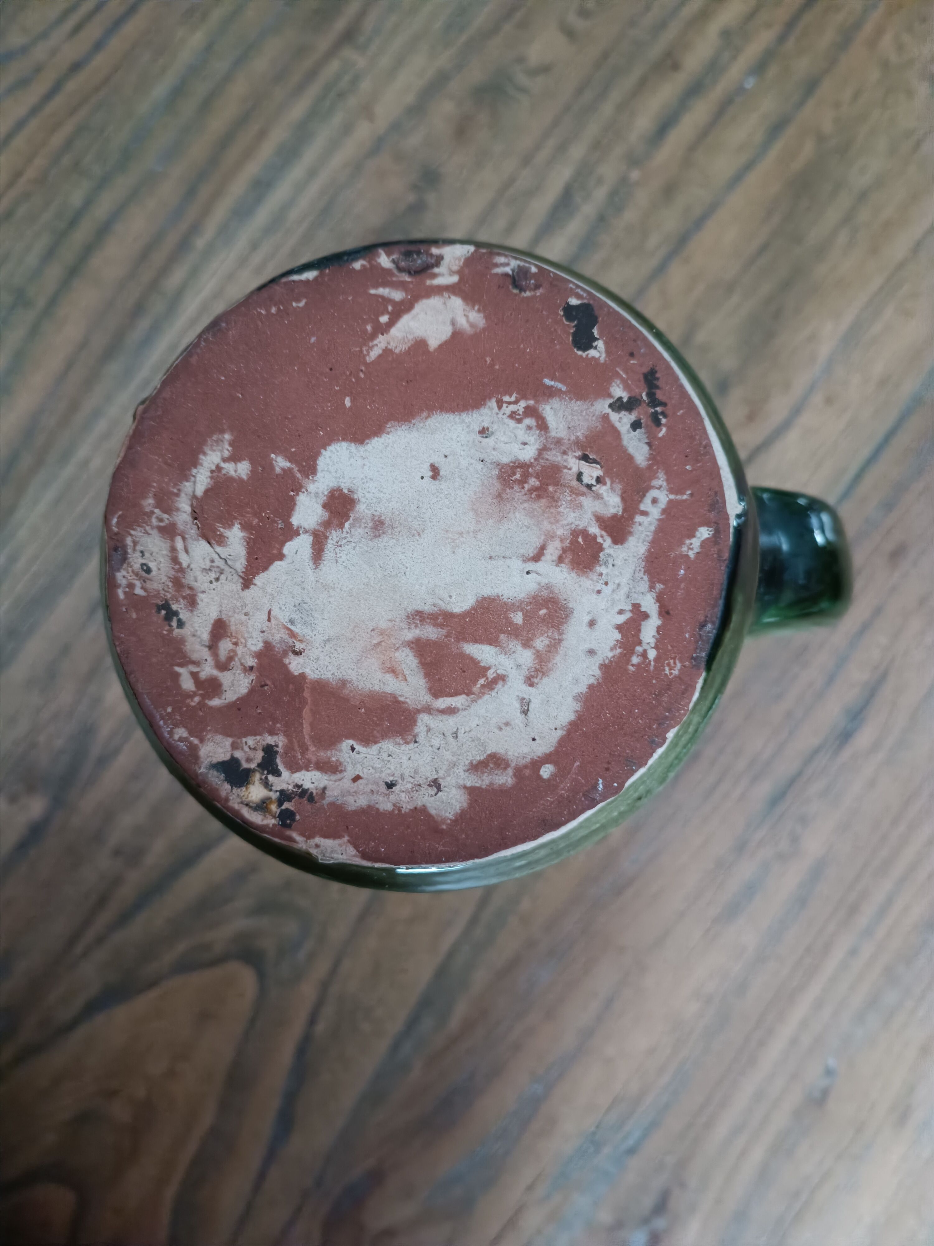 Glazed terracotta pitcher