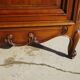 Louis XV style bonnetière in solid cherry wood