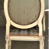 Louis XVI style armchair in cream lacquered wood