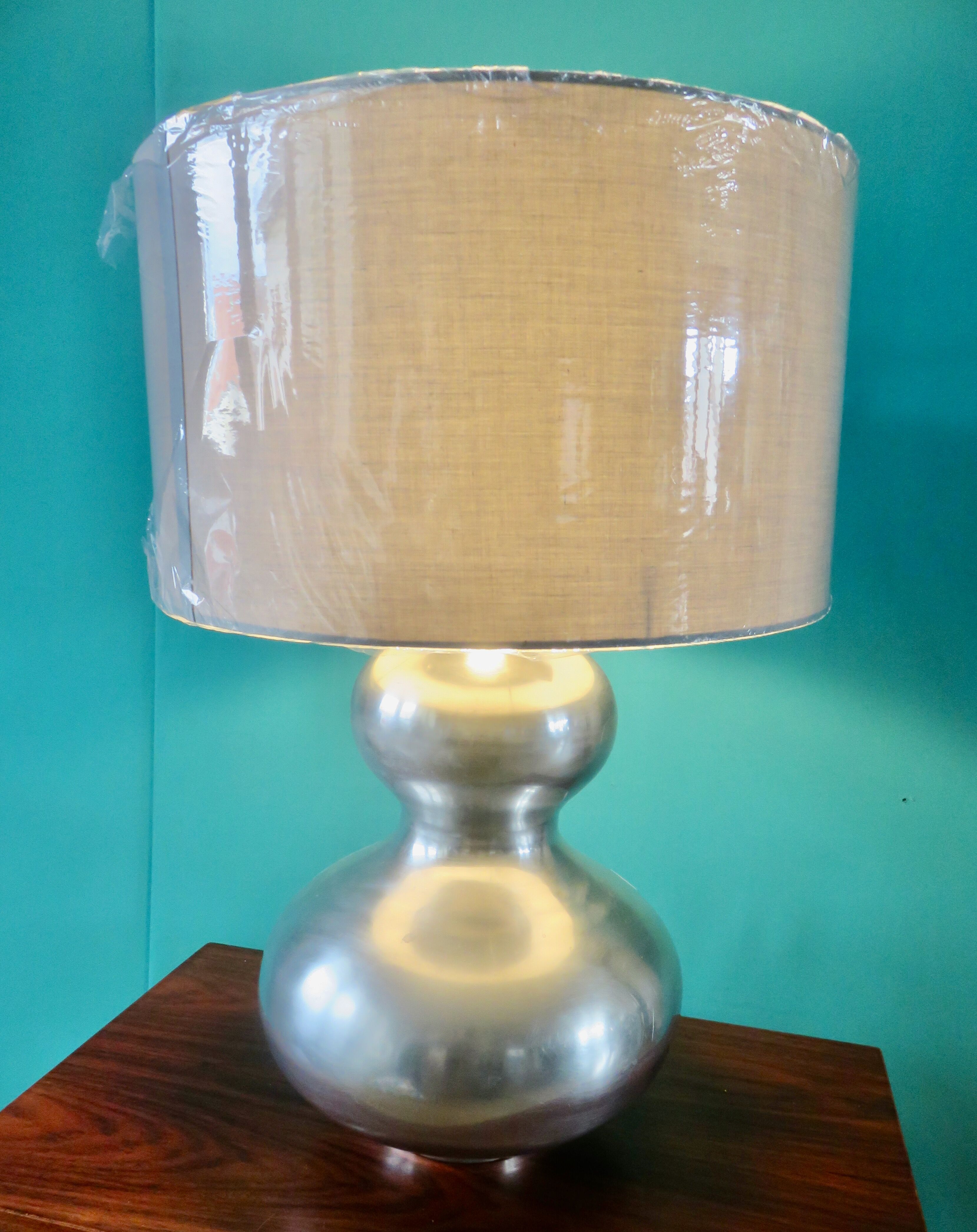 Lampe en acier brossé. France 1970