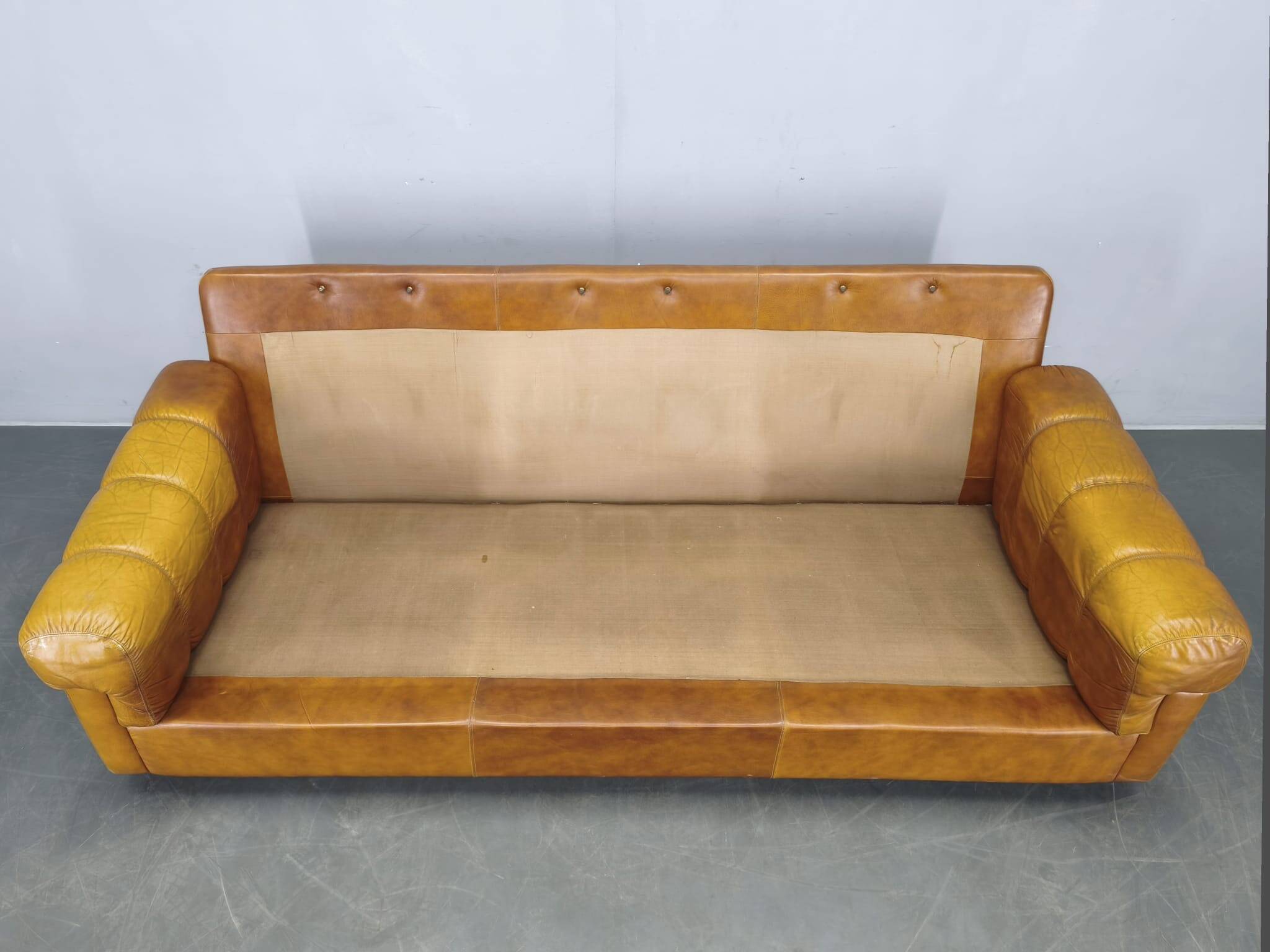 Three-seater sofa from the mid-century produced in Italy in the 1970s.