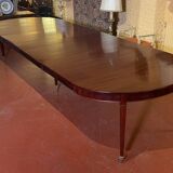 Extensible Louis XVI dining table in period Directoire mahogany.