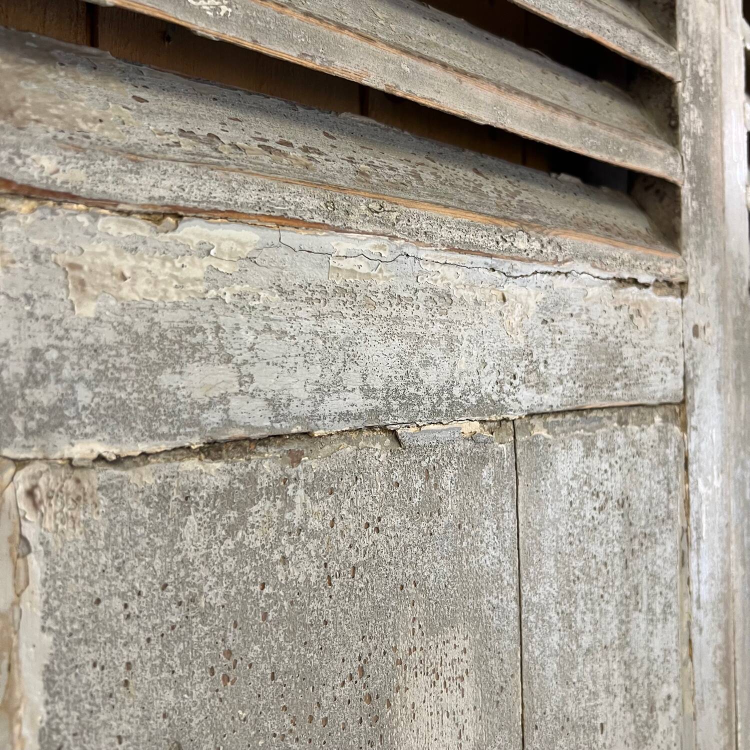 Pair of patinated gray shutters